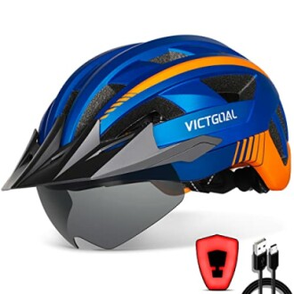 Blue and orange cycling helmet with visor and USB cable.