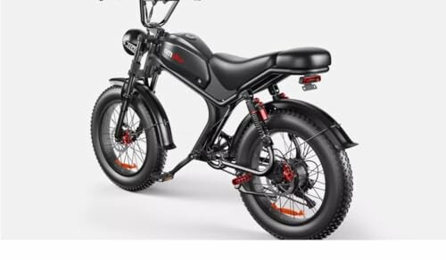 Black electric fat tire bike with red accents on a white background